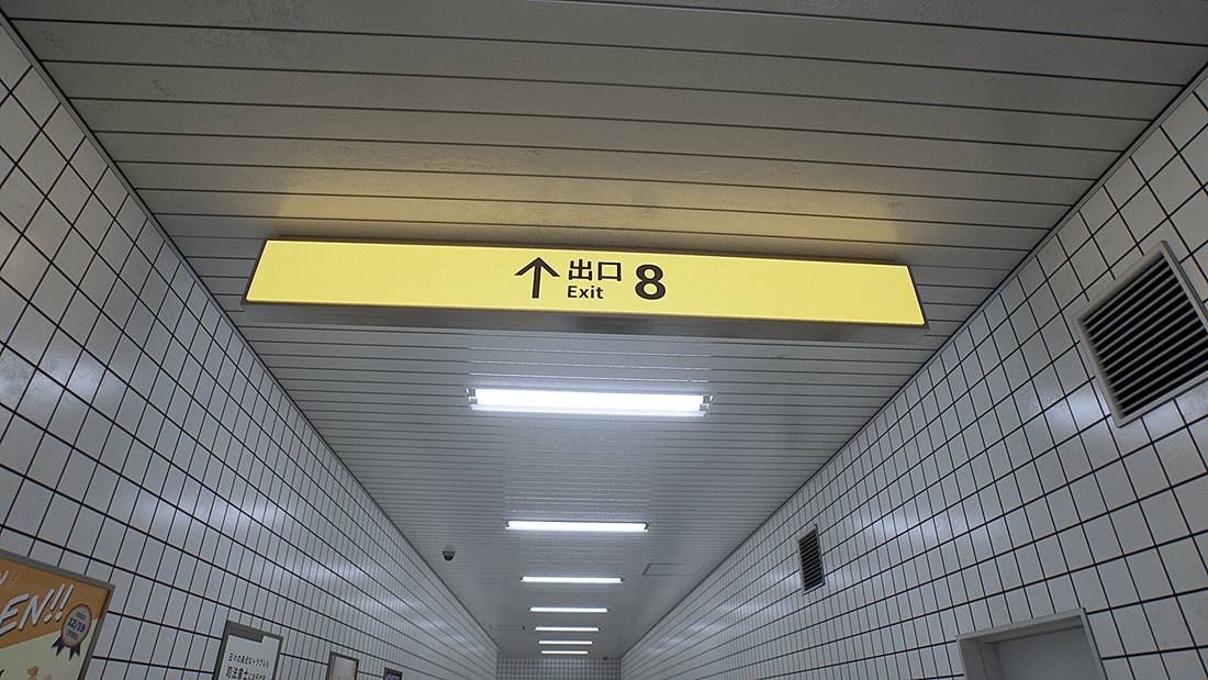 通路の黄色い案内板